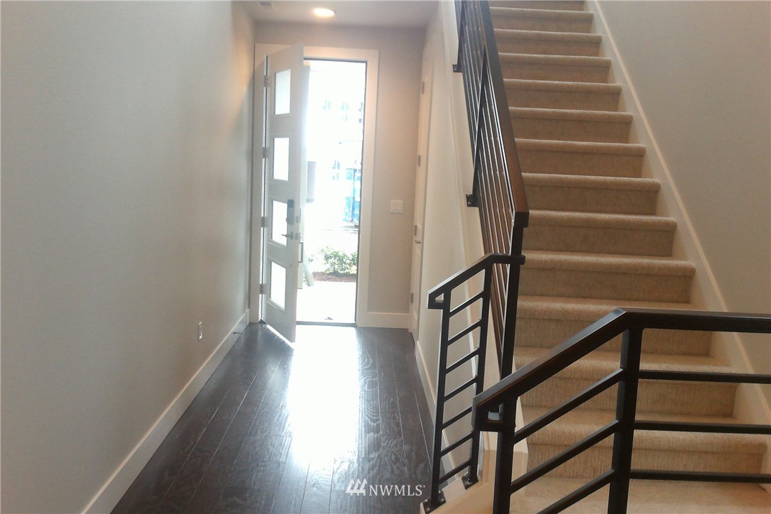 4323 223rd Place Southeast Bothell, WA 98021 - Photo 3 of 15 a view of entryway with wooden floor and stairs