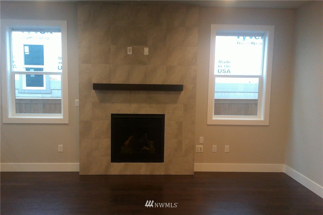 4323 223rd Place Southeast Bothell, WA 98021 - Photo 4 of 15 a view of an empty room with a window