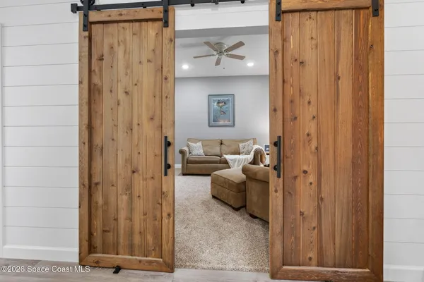 a view of entryway with livingroom