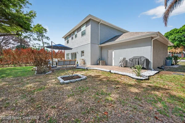 a house view with a outdoor space