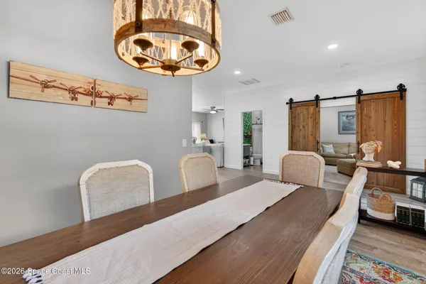 a bedroom with bed and window