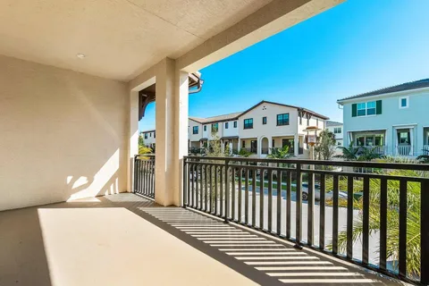 a view of a houses with a balcony