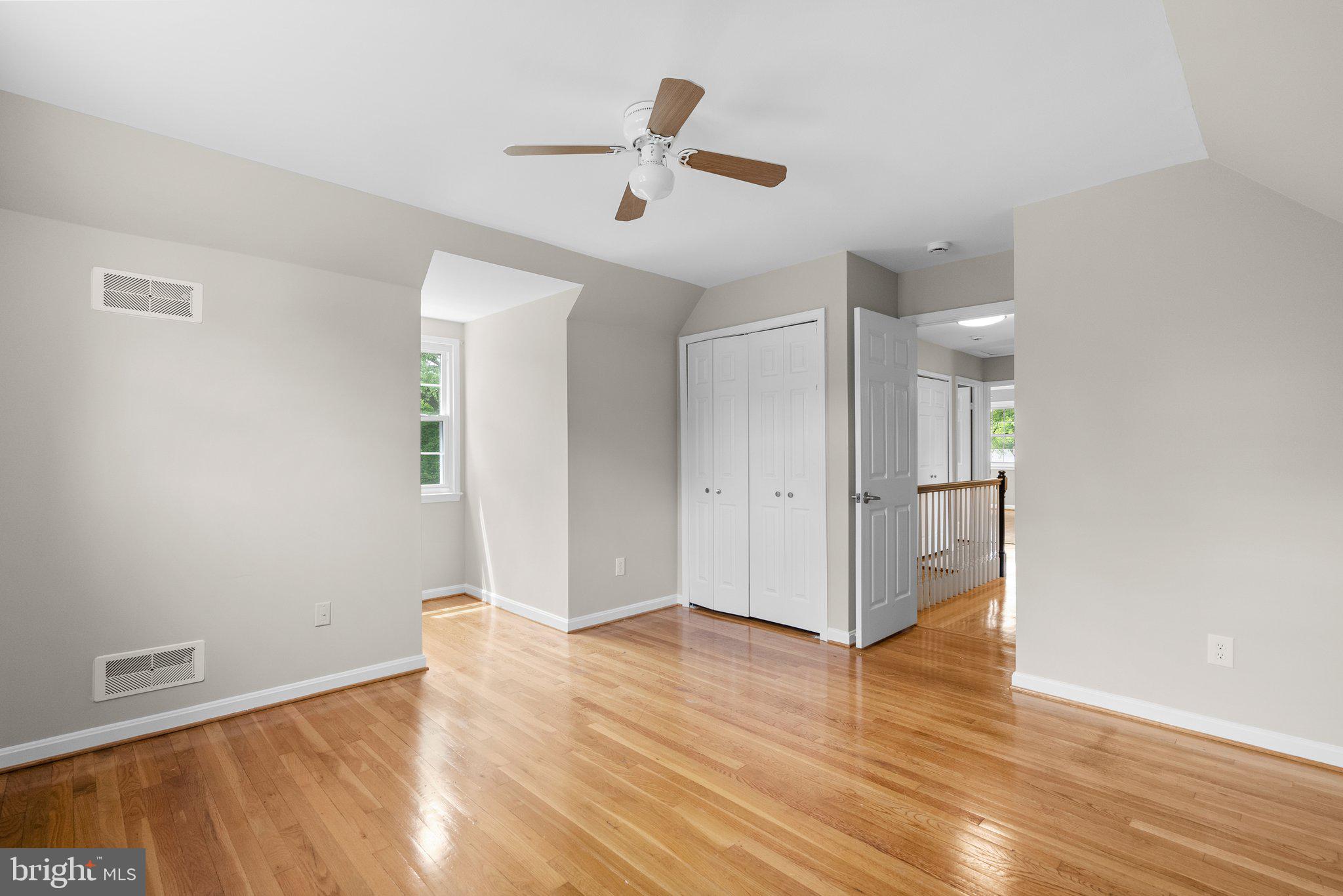 14201 Ansted Road Silver Spring, MD 20905 - Photo 36 of 44 a view of empty room with wooden floor