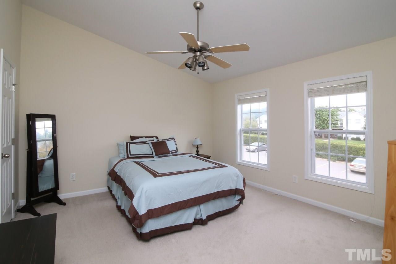 2110 Piney Brook Road, Unit 102 Raleigh, NC 27614 - Photo 13 of 24 The master suite includes two walk-in closets.