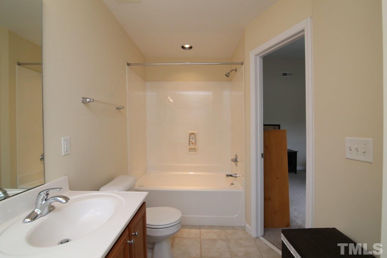 2110 Piney Brook Road, Unit 102 Raleigh, NC 27614 - Photo 14 of 24 The master bath has a whirlpool tub with shower.