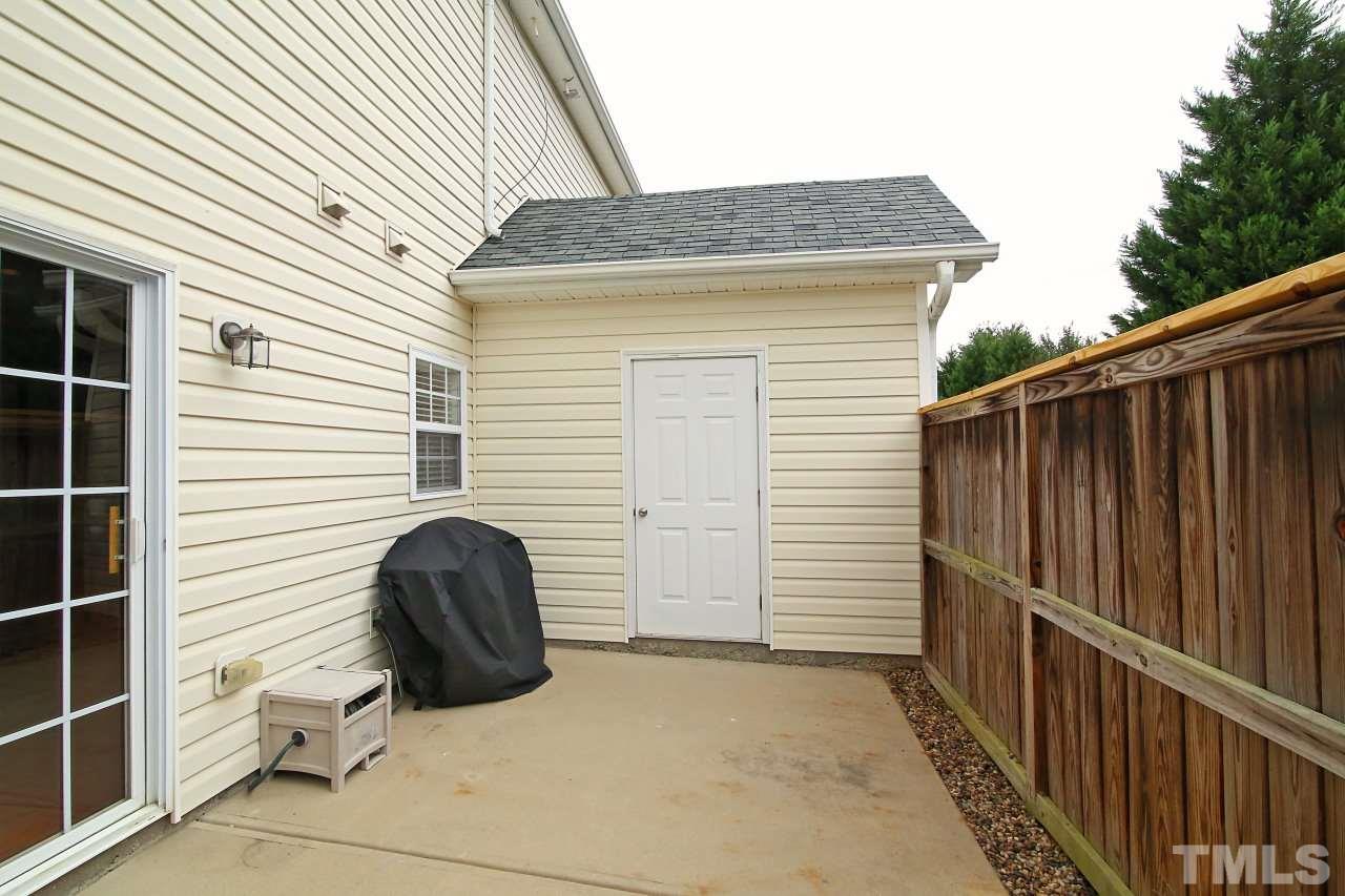 2110 Piney Brook Road, Unit 102 Raleigh, NC 27614 - Photo 18 of 24 The patio area includes a storage room.