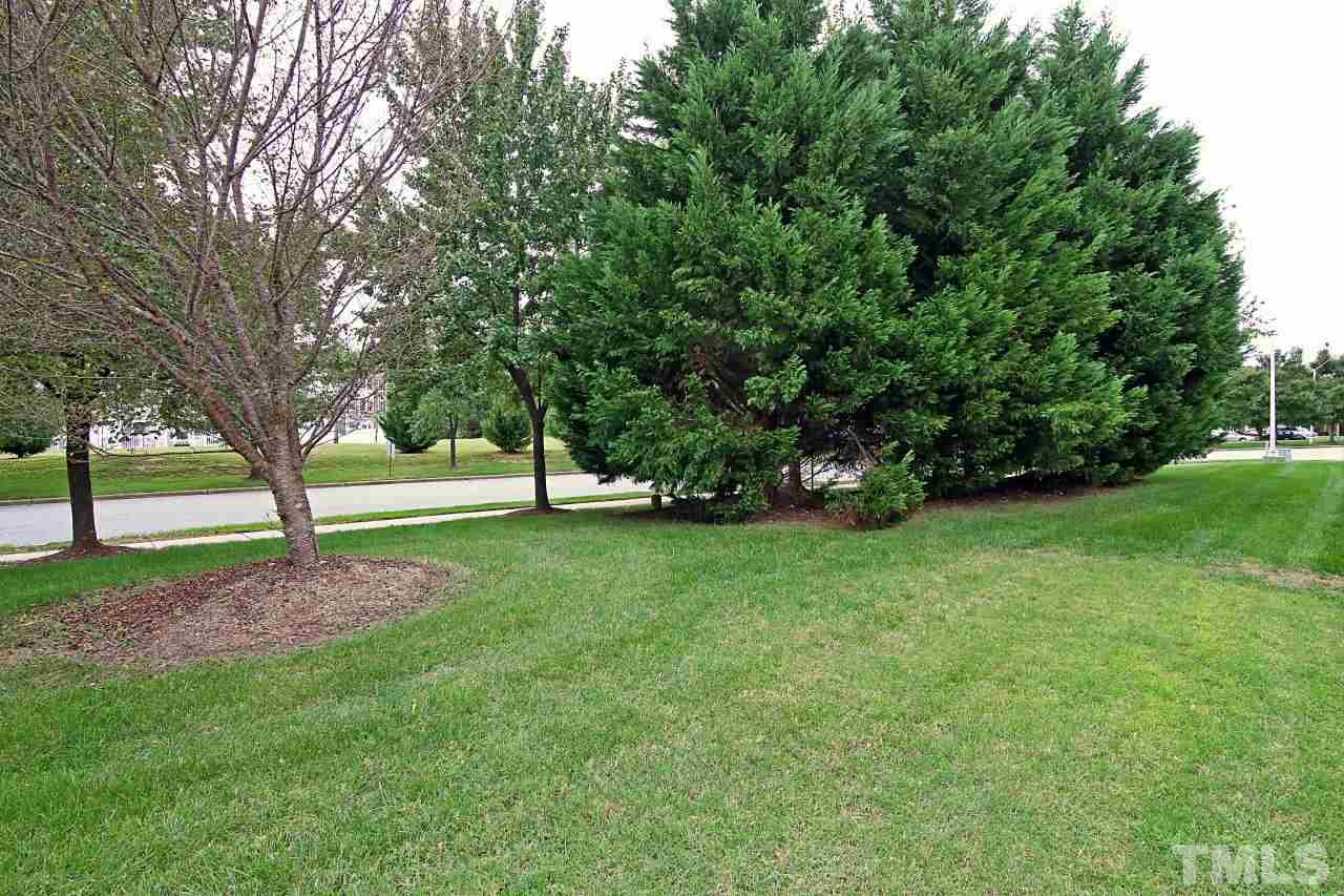 2110 Piney Brook Road, Unit 102 Raleigh, NC 27614 - Photo 21 of 24 This is the attractive landscaping behind the home.
