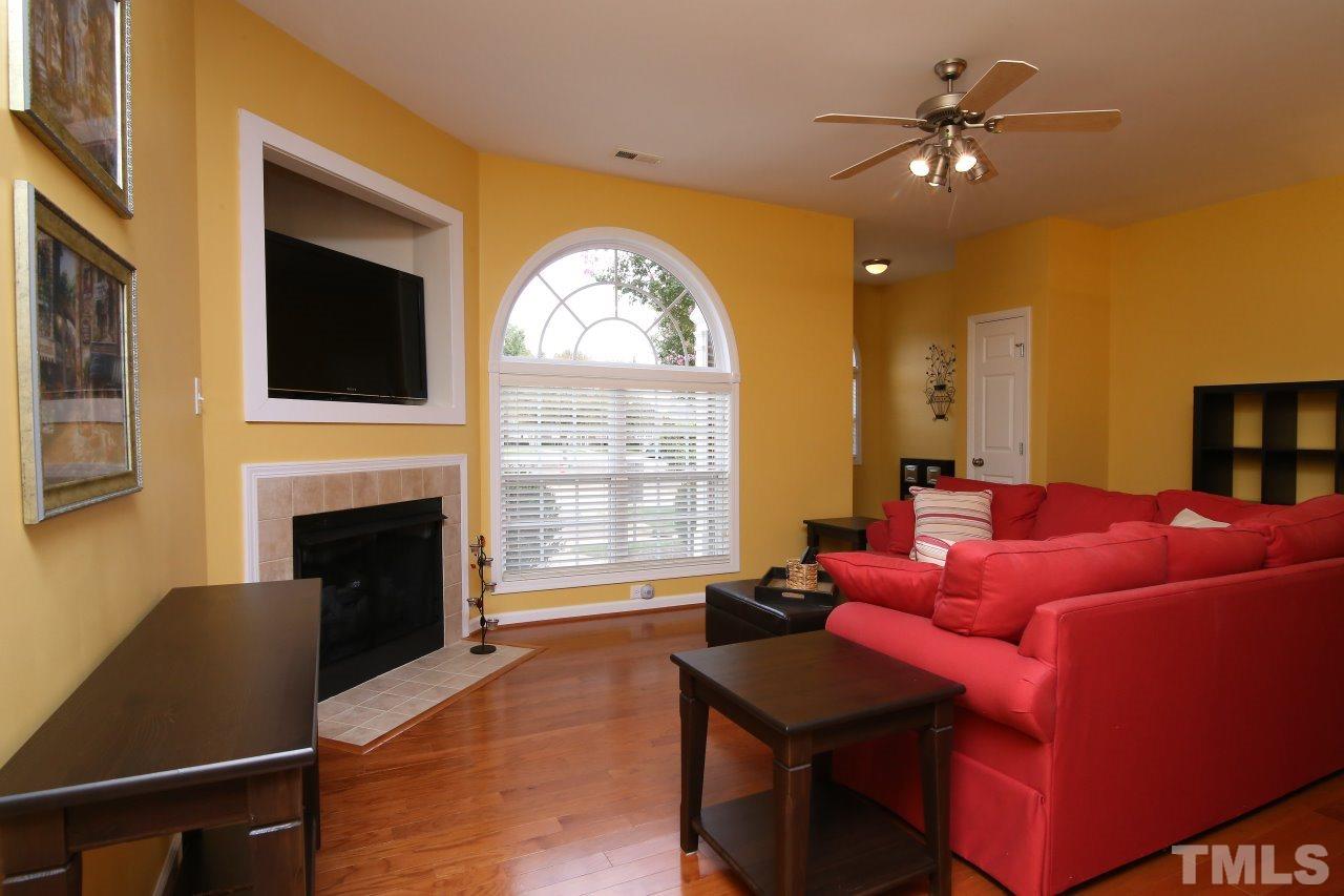 2110 Piney Brook Road, Unit 102 Raleigh, NC 27614 - Photo 5 of 24 This is the reverse view of the living room. Note the gas log fireplace.
