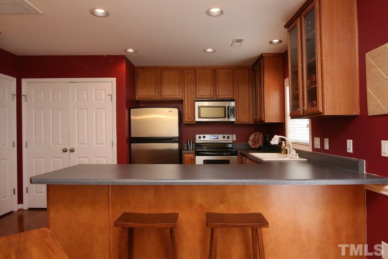 2110 Piney Brook Road, Unit 102 Raleigh, NC 27614 - Photo 10 of 24 The double doors lead to the laundry area.