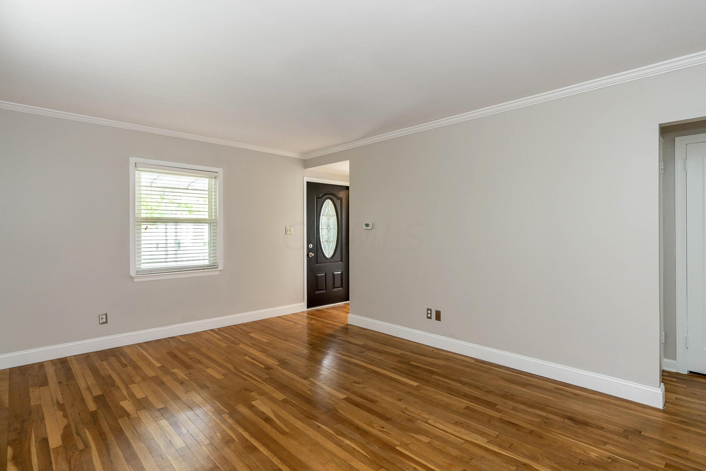 588 Northridge Road Columbus, OH 43214 - Photo 6 of 31 Living room features beautiful wood flooring