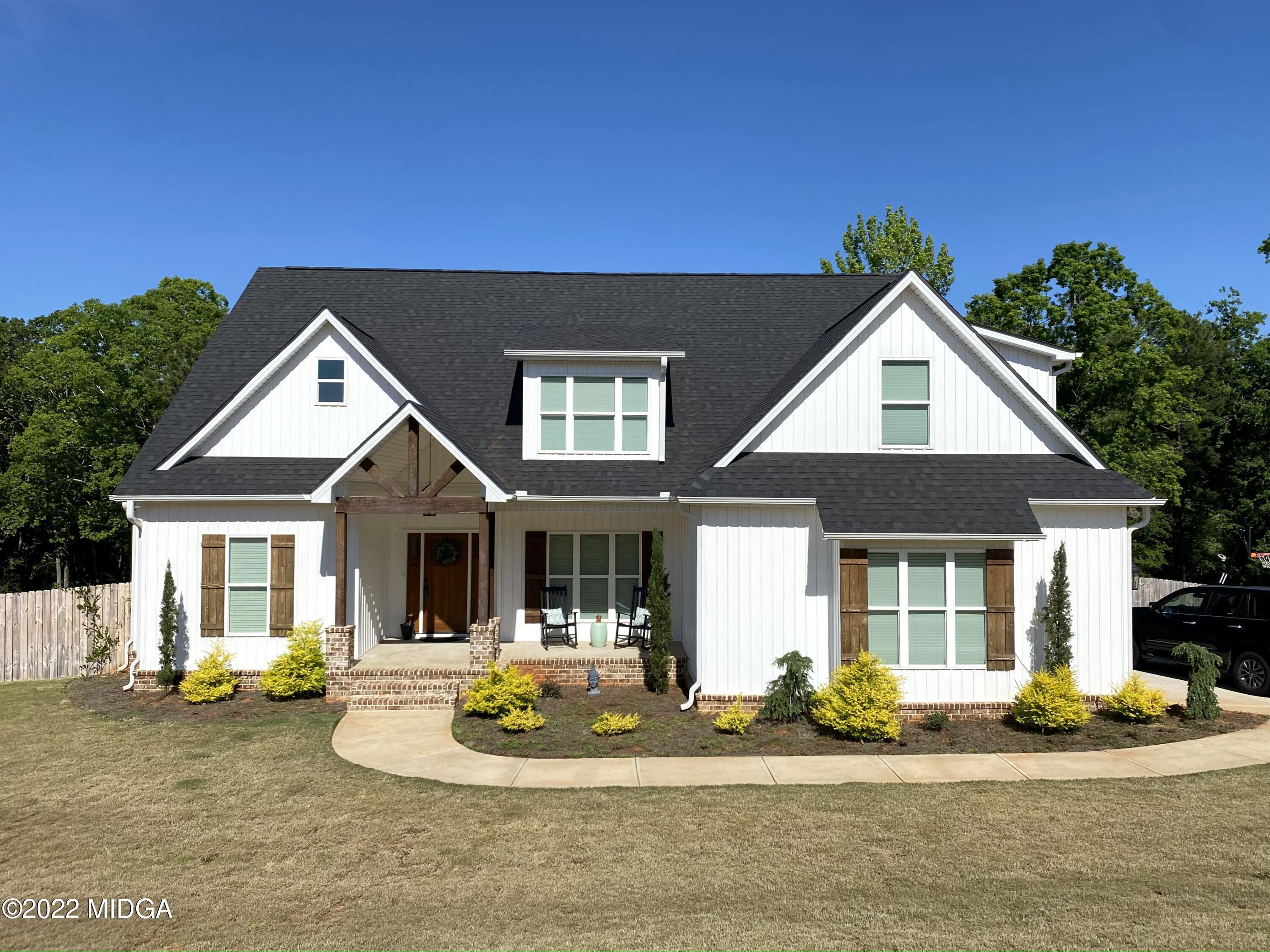 101 Carters Way Forsyth, GA 31029 - Photo 1 of 28 a front view of a house with a yard