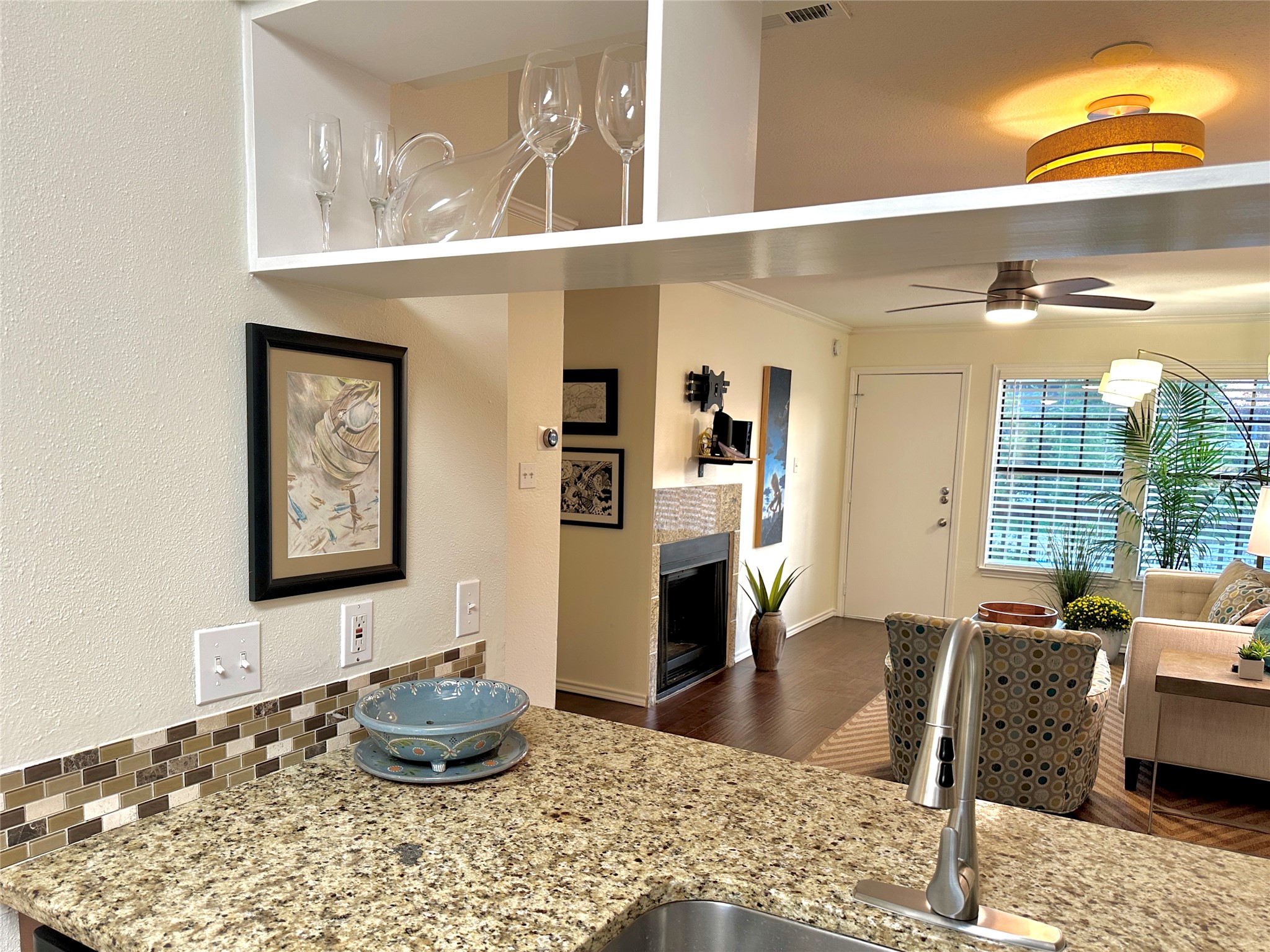 2215 Post Road, Unit 2055 Austin, TX 78704 - Photo 30 of 30 An open floor plan seamlessly connects the kitchen counter with views into the dining area and living room.