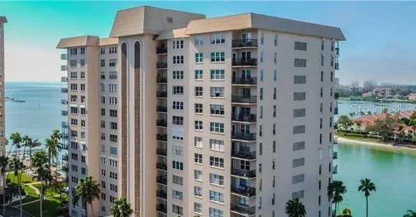 a view of a building with a garden