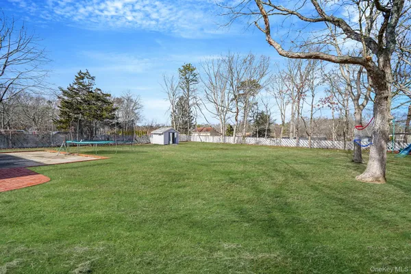 $559,000 | 67 Pentmoor Drive, Mastic, NY 11950