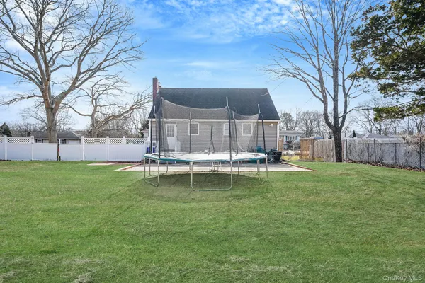 $559,000 | 67 Pentmoor Drive, Mastic, NY 11950