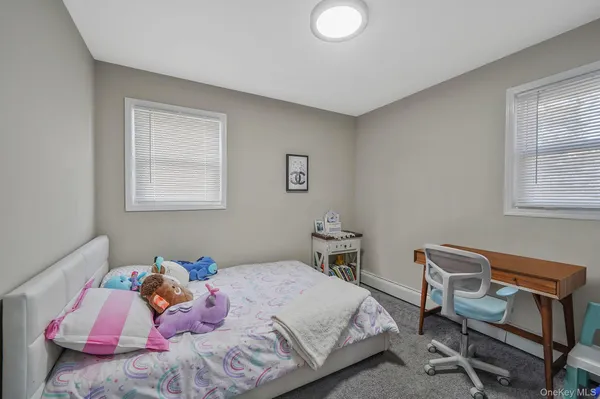 $559,000 | 67 Pentmoor Drive, Mastic, NY 11950