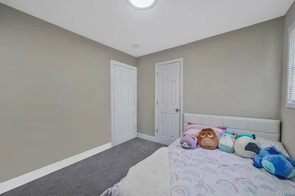 $559,000 | 67 Pentmoor Drive, Mastic, NY 11950