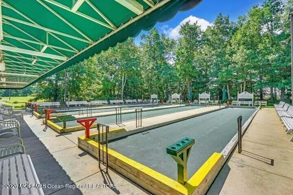 a view of a swimming pool with a patio