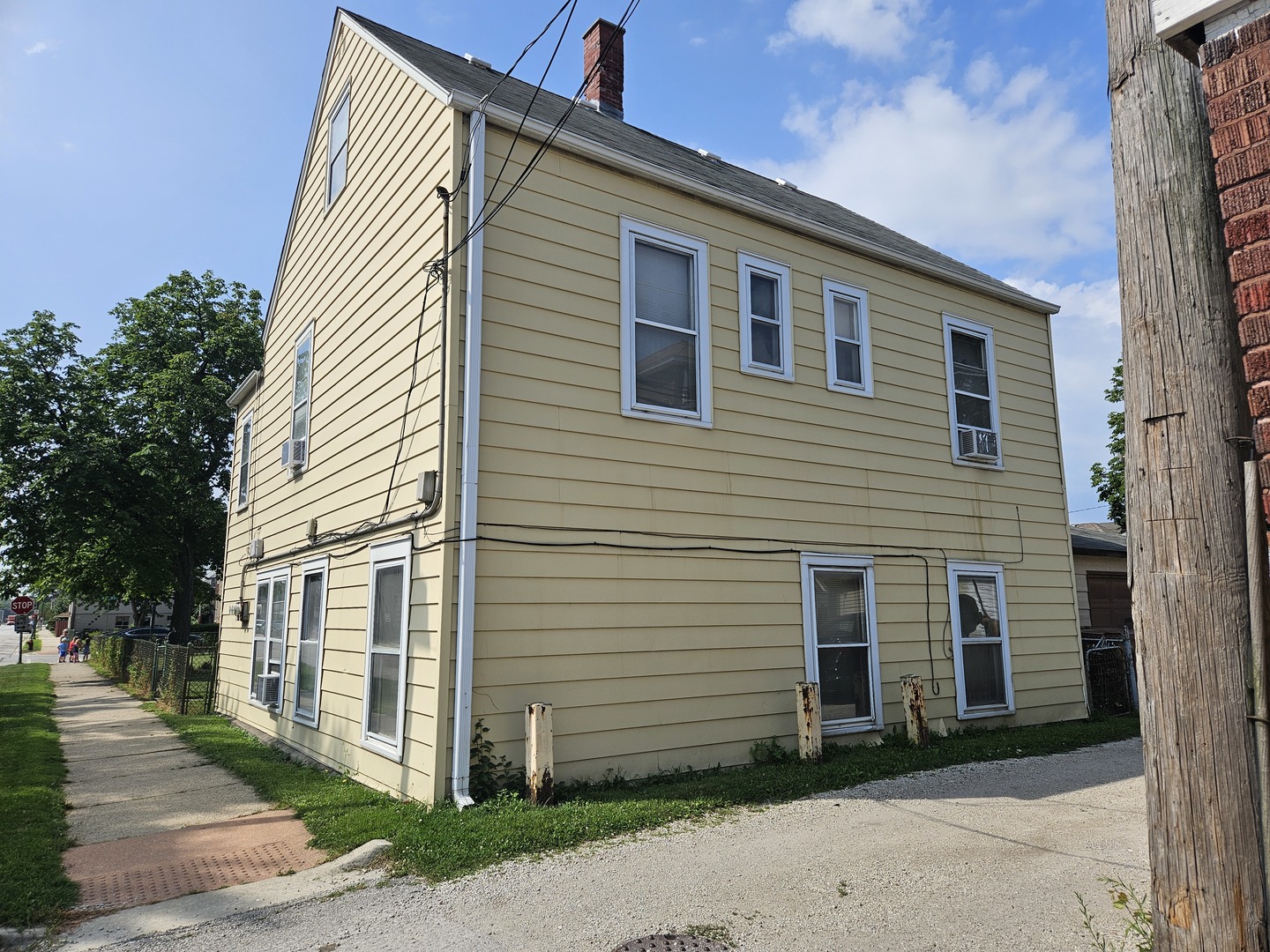 7600 West 61st Street Summit, IL 60501 - Photo 2 of 3 a view of a house with a yard