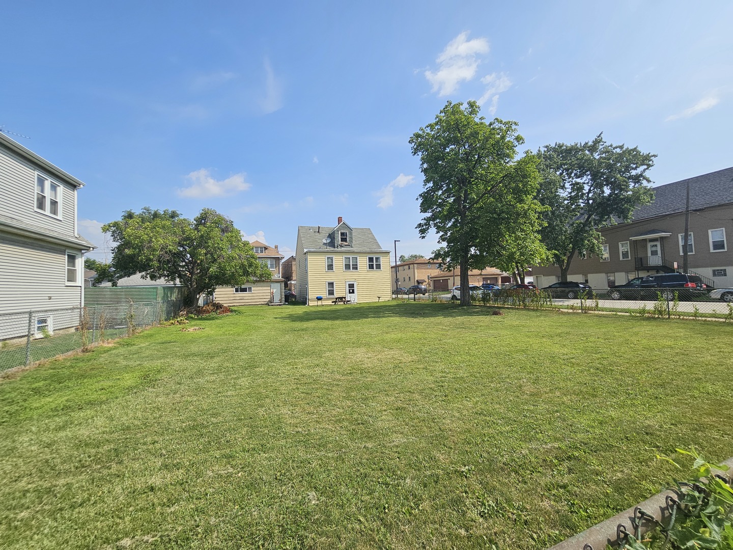 7600 West 61st Street Summit, IL 60501 - Photo 3 of 3 a view of a street with houses