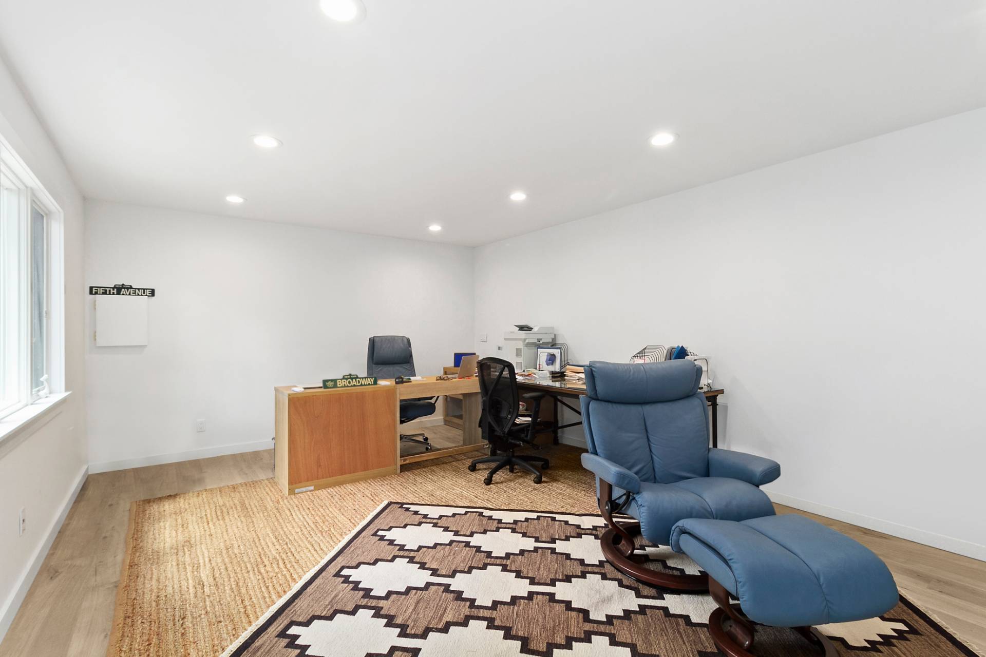 23 Wendy Lane Bridgehampton, NY 11932 - Photo 16 of 16 a living room with furniture and a rug