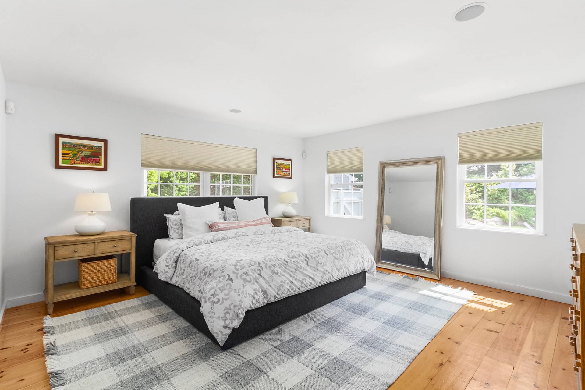 23 Wendy Lane Bridgehampton, NY 11932 - Photo 7 of 16 a bedroom with a large bed and a couch