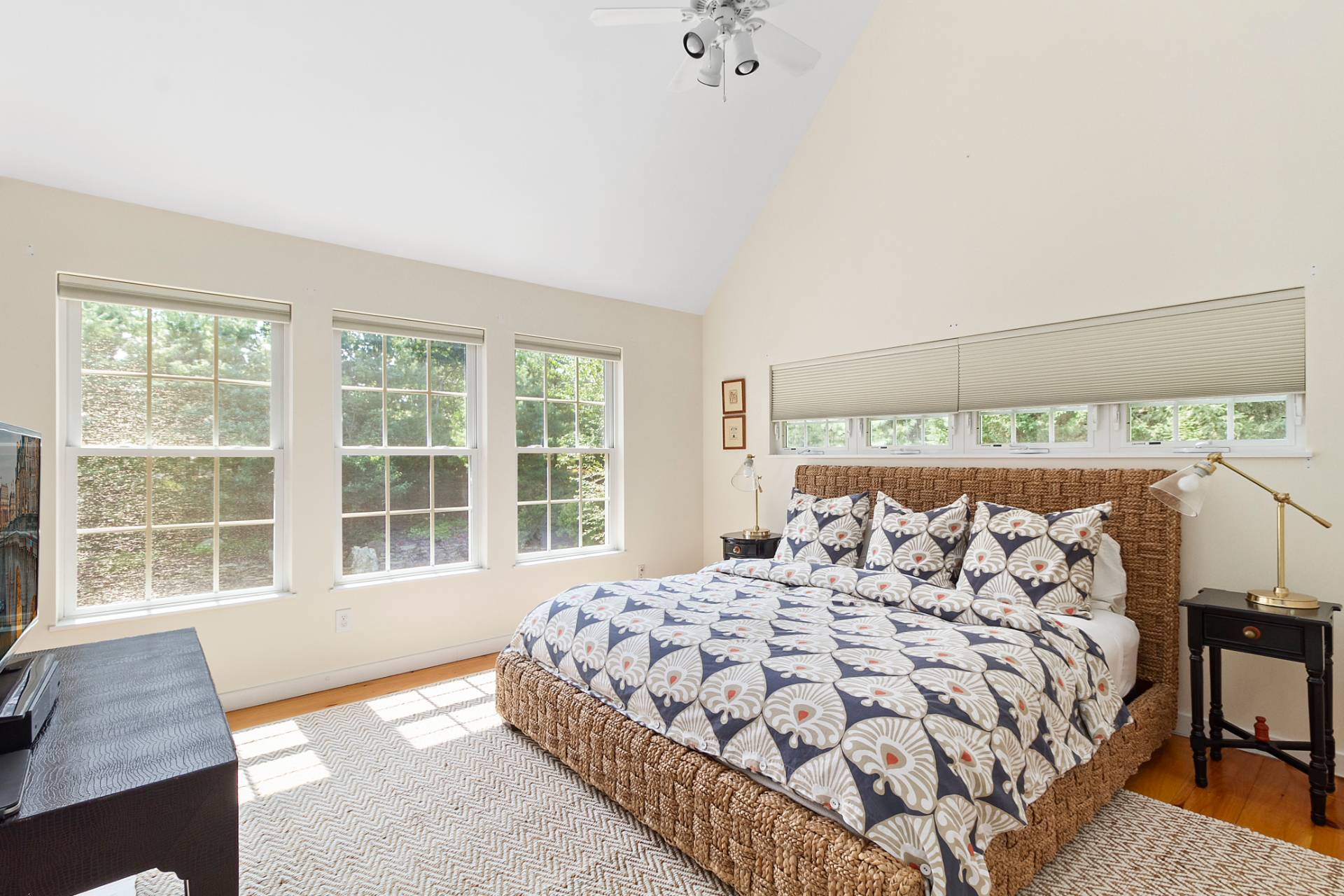 23 Wendy Lane Bridgehampton, NY 11932 - Photo 9 of 16 a bedroom with a large bed and a window