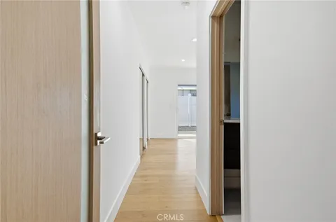 a view of a bathroom from the hallway