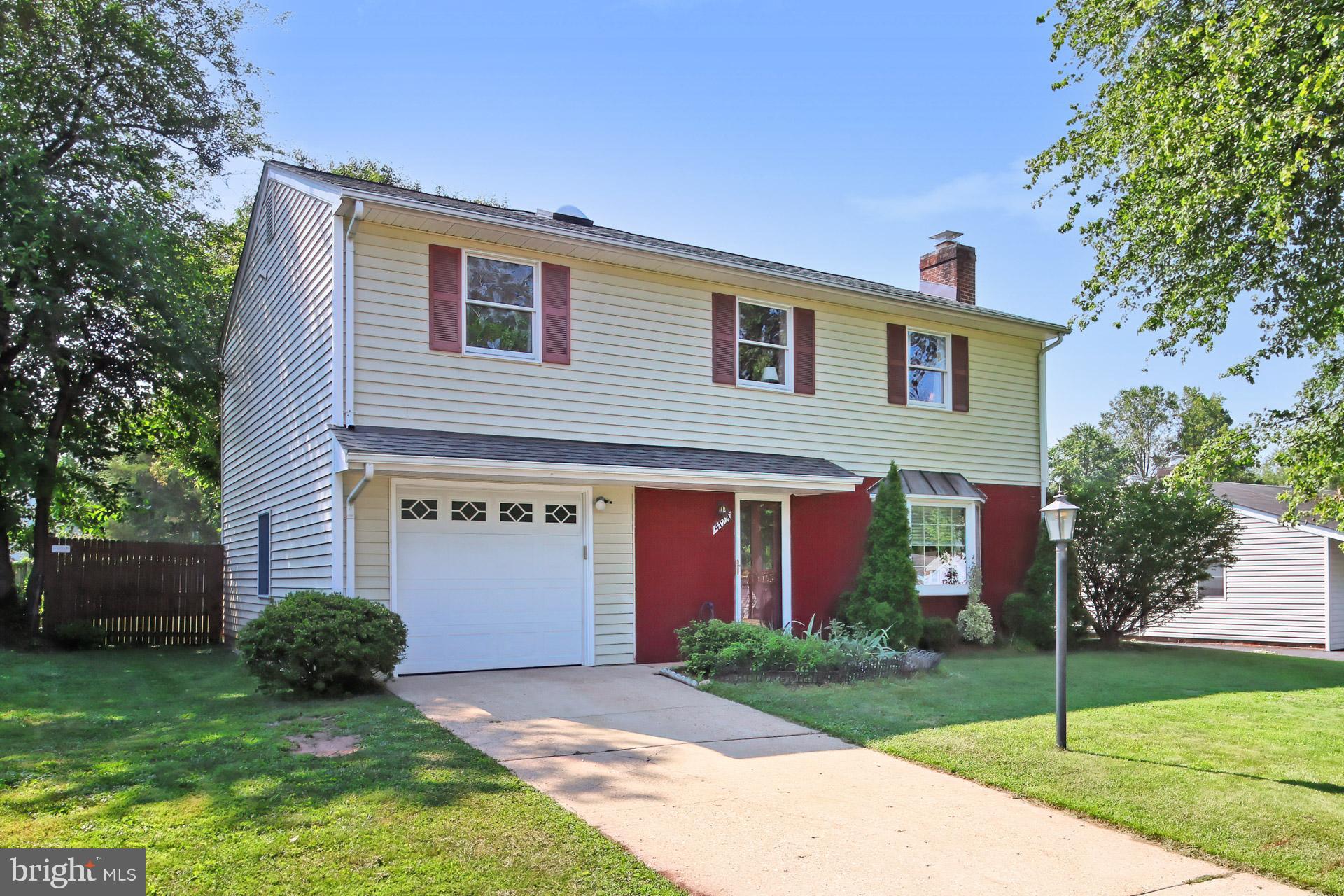 4123 Lees Corner Road Chantilly, VA 20151 - Photo 2 of 47 a front view of a house with garden