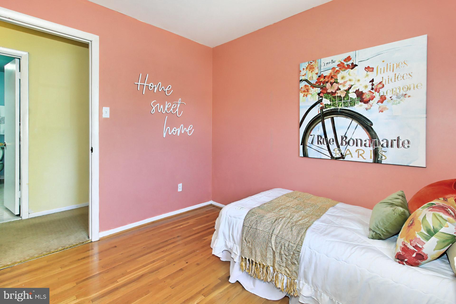 4123 Lees Corner Road Chantilly, VA 20151 - Photo 32 of 47 a bedroom with a bed and painting on the wall