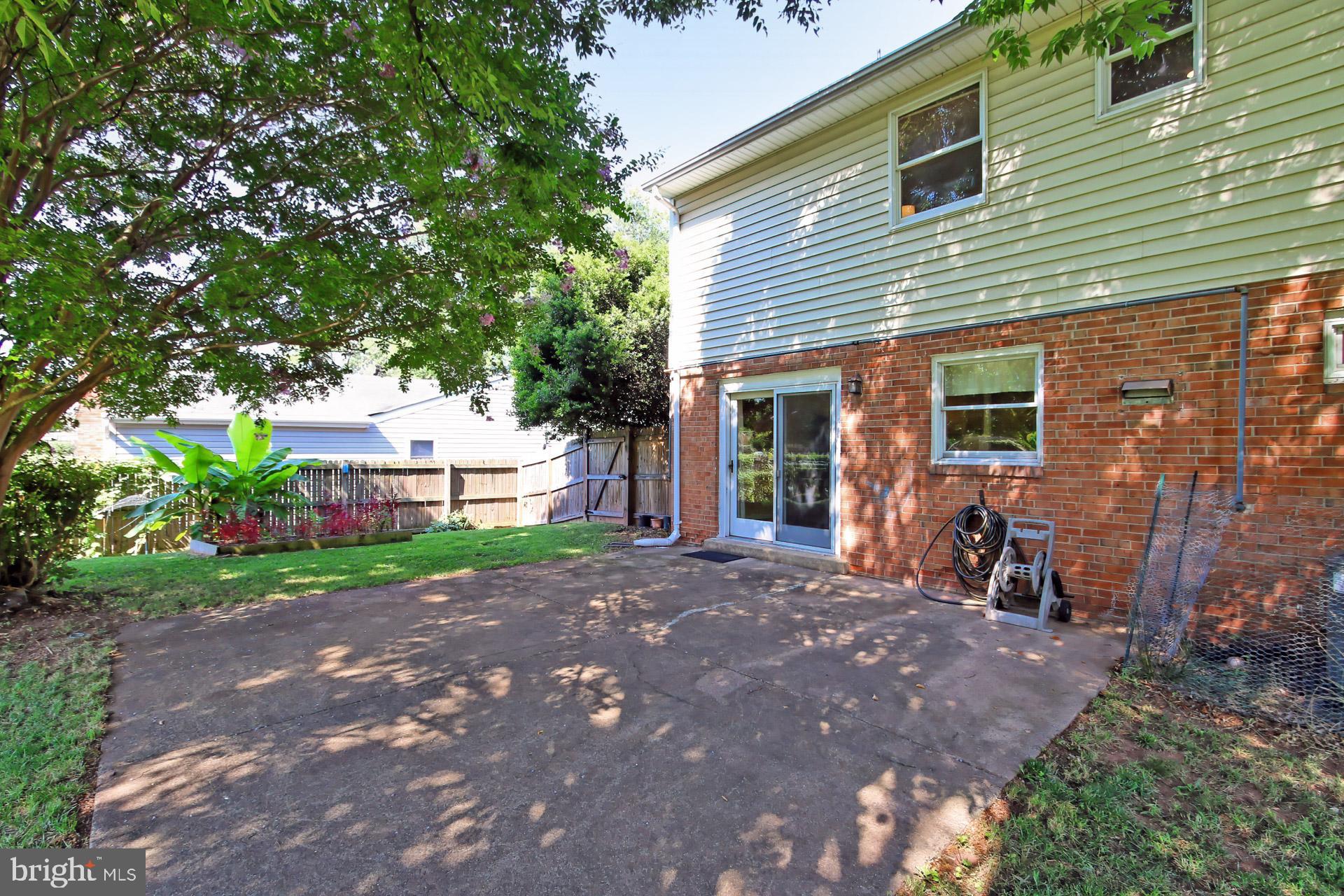 4123 Lees Corner Road Chantilly, VA 20151 - Photo 41 of 47 a view of a house with a yard and tree s