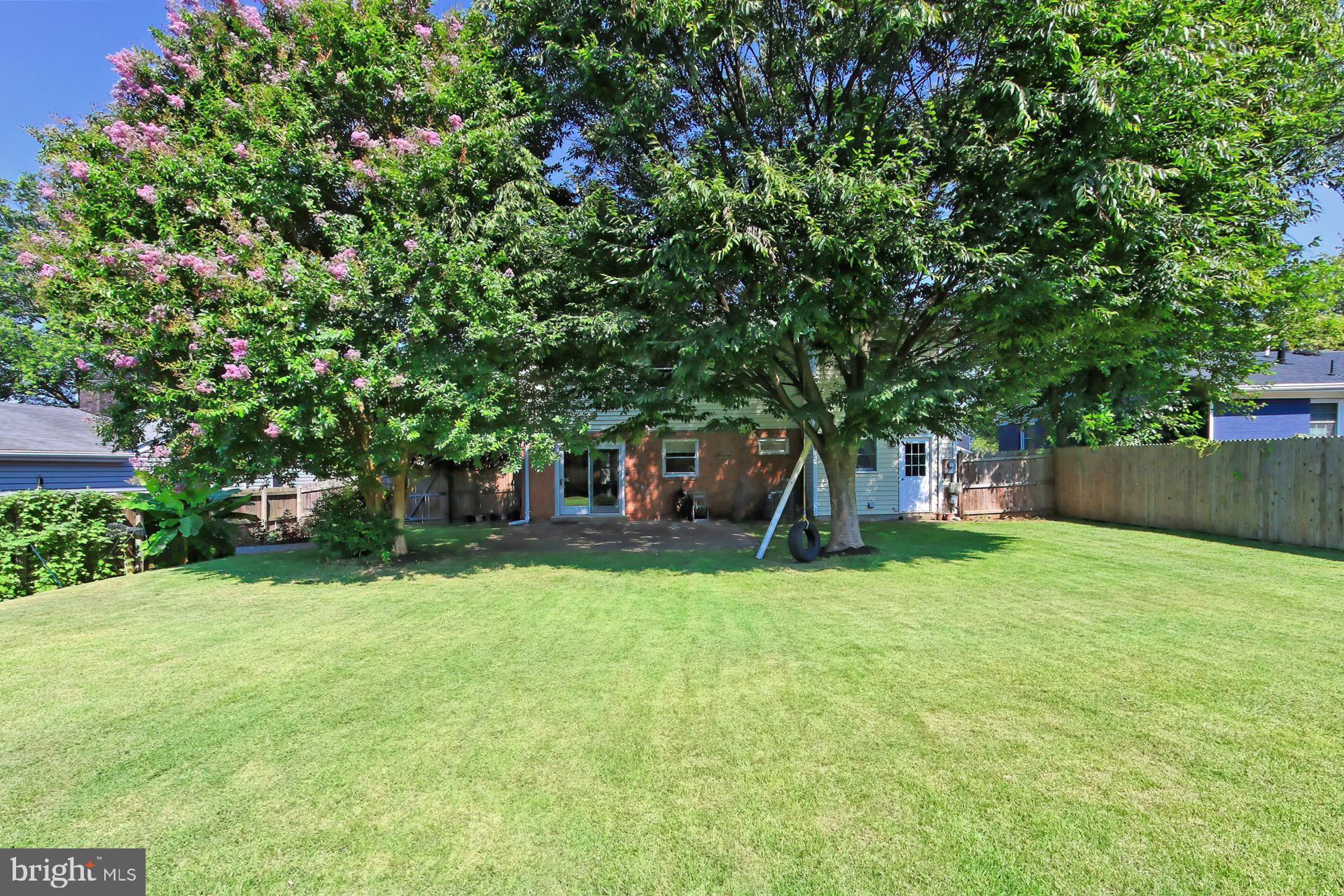 4123 Lees Corner Road Chantilly, VA 20151 - Photo 45 of 47 a front view of a house with a yard and trees