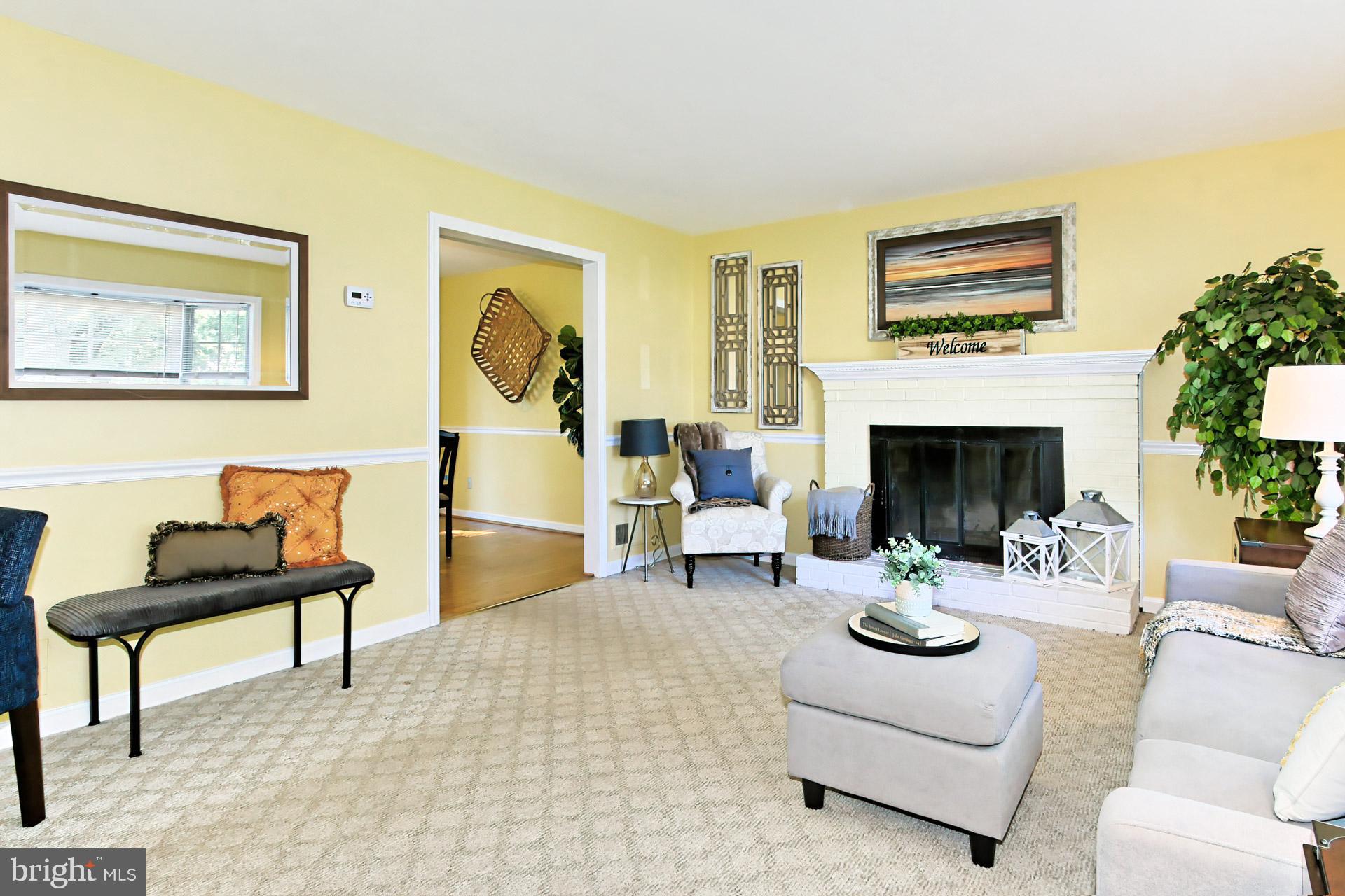 4123 Lees Corner Road Chantilly, VA 20151 - Photo 9 of 47 a living room with furniture and a fireplace