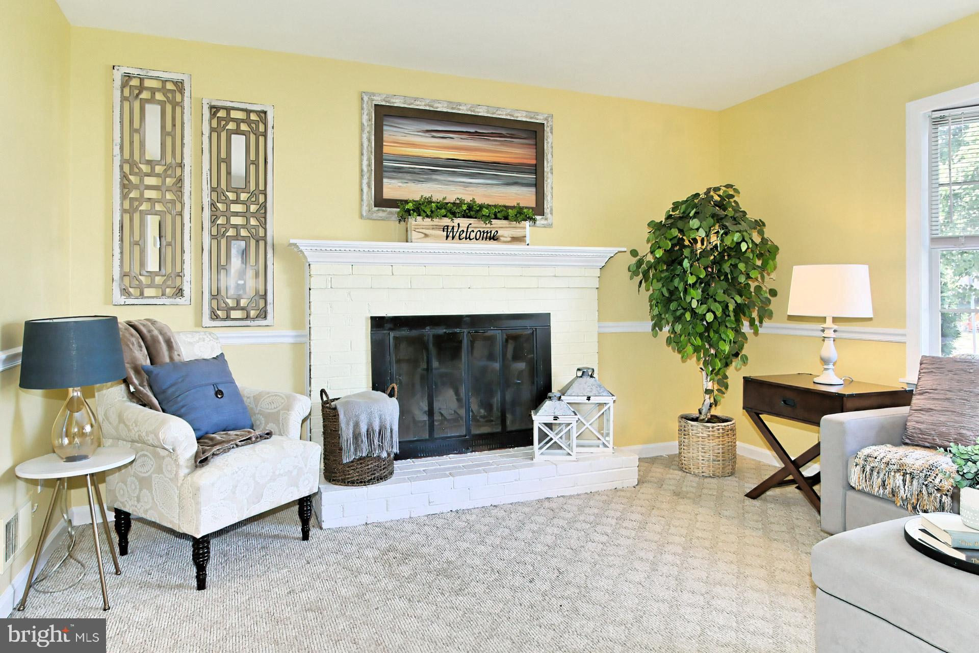 4123 Lees Corner Road Chantilly, VA 20151 - Photo 10 of 47 a living room with furniture and a fireplace