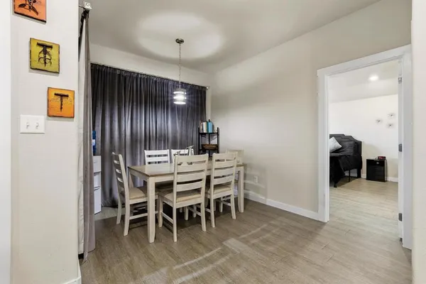 a view of storage and utility room with washer and dryer
