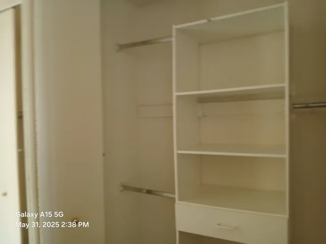 a view of a walk in closet