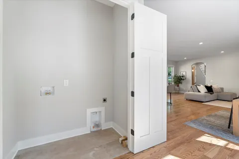 a view of a livingroom with furniture and a rug