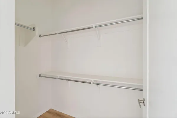 a view of a room with racks on the wall