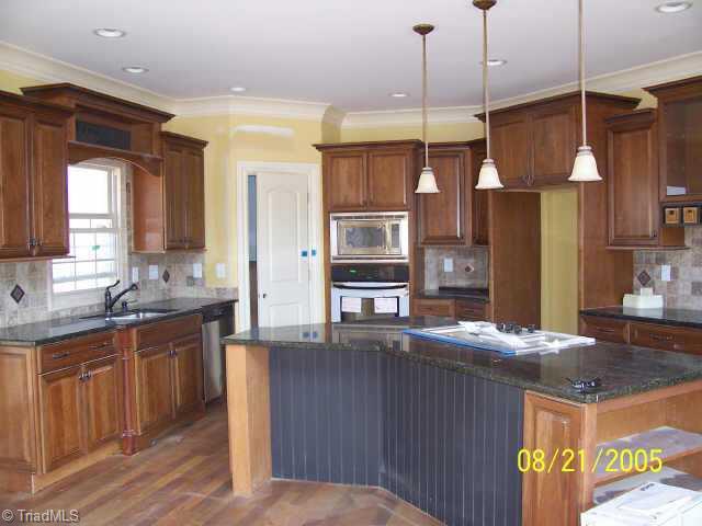 Other. Kitchen with Granite Countertops and Stainless Appliances