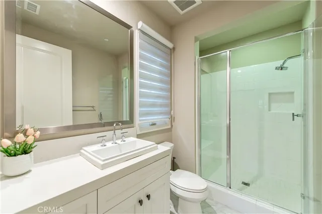 a view of entryway with wooden floor and stairs