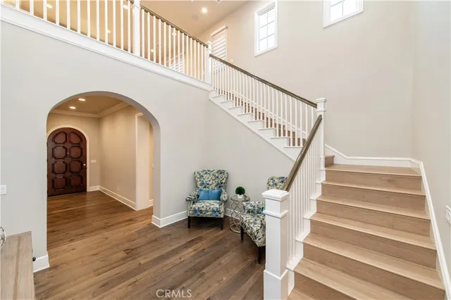 a bathroom with a sink toilet and a mirror