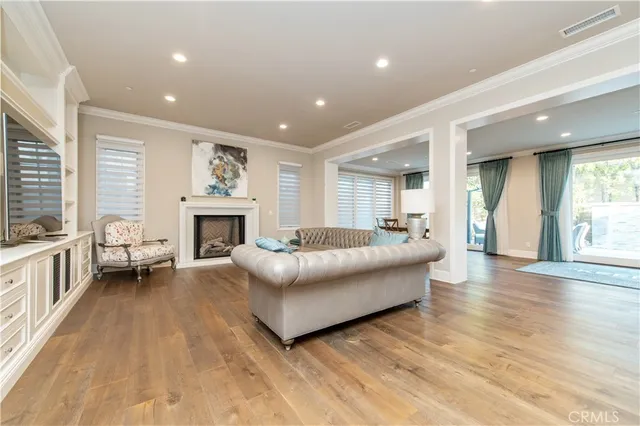 a view of kitchen with cabinets table and chairs