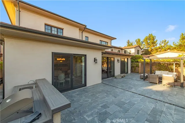 a view of a hallway with a washer and dryer