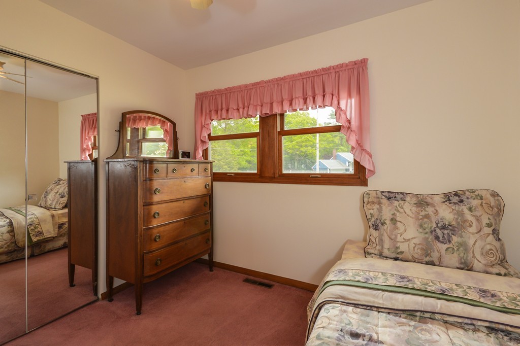 8 Quaker Circle Pembroke, MA 02359 - Photo 15 of 30 a bedroom with a bed and a window