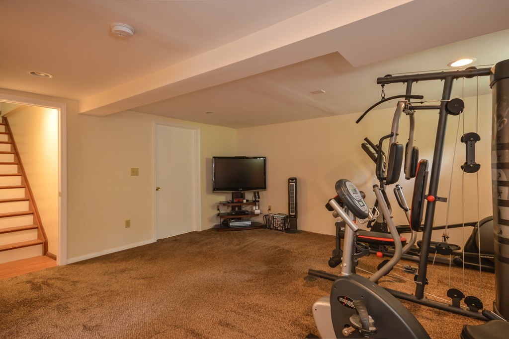 8 Quaker Circle Pembroke, MA 02359 - Photo 25 of 30 a view of a room with gym equipment