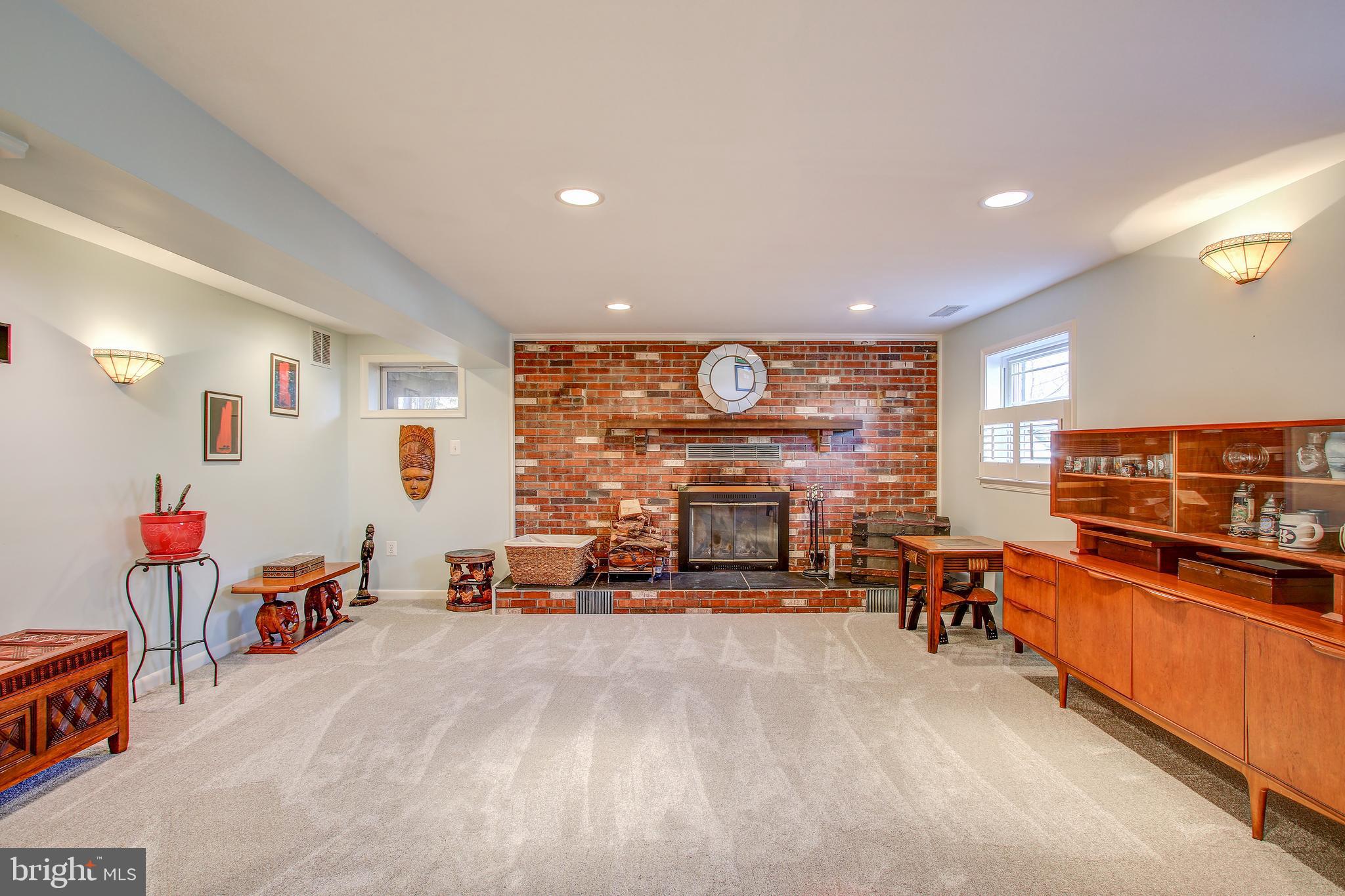 3705 Falling Green Road Olney, MD 20832 - Photo 24 of 32 Den With Wood Burning Fireplace