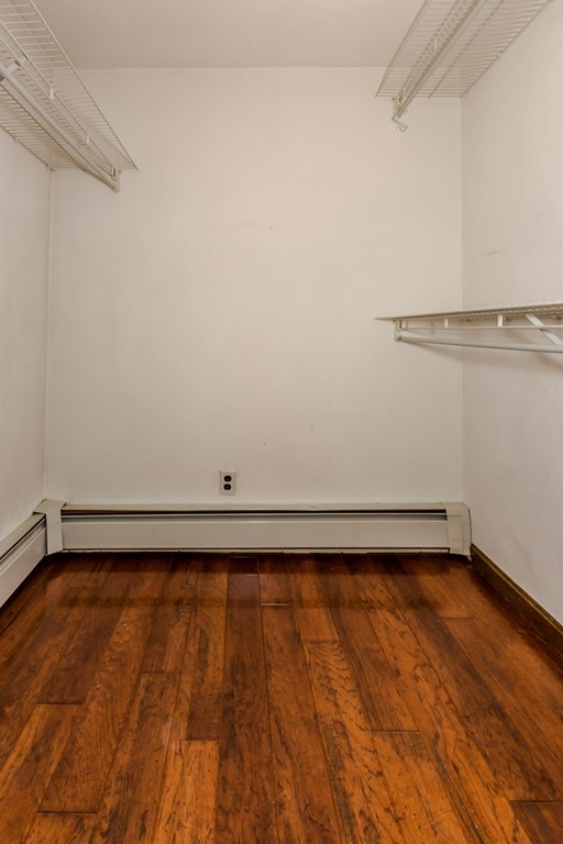 171 Taylor Road Stow, MA 01775 - Photo 11 of 18 a view of a room with wooden floor and a window