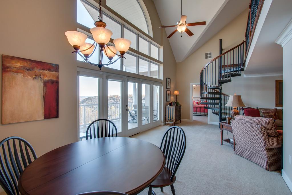 7100 Dale Ridge Road, Unit F5 Lancaster, TN 38569 - Photo 5 of 29 Easy traffic flow from LR to DR. Love those 2 story windows flooding the space with light!