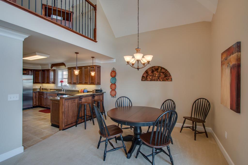 7100 Dale Ridge Road, Unit F5 Lancaster, TN 38569 - Photo 7 of 29 Plenty of space for dining table & chairs, AND you can seat people at the bar too!