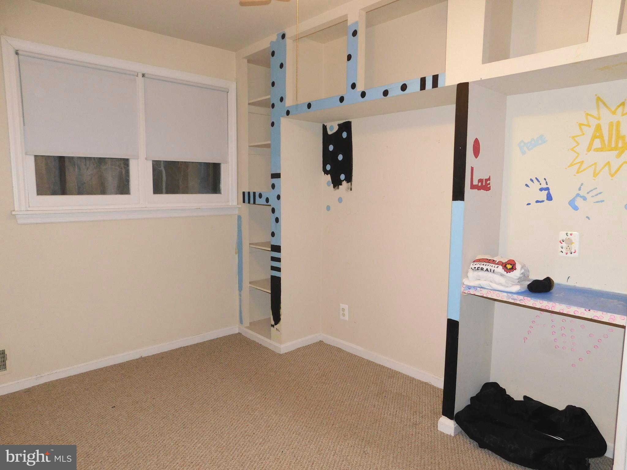 224 Cheddington Road Linthicum, MD 21090 - Photo 8 of 18 a bathroom with a shower and a sink